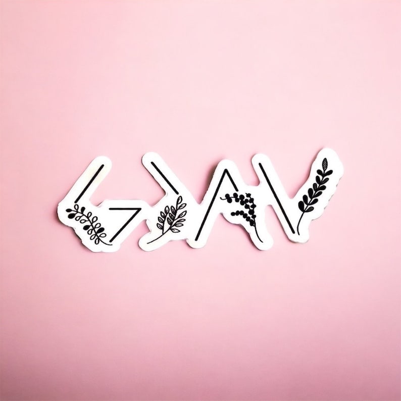 May include: Black and white graphic of the word "God" with stylised arrows and floral accents on a pink background.