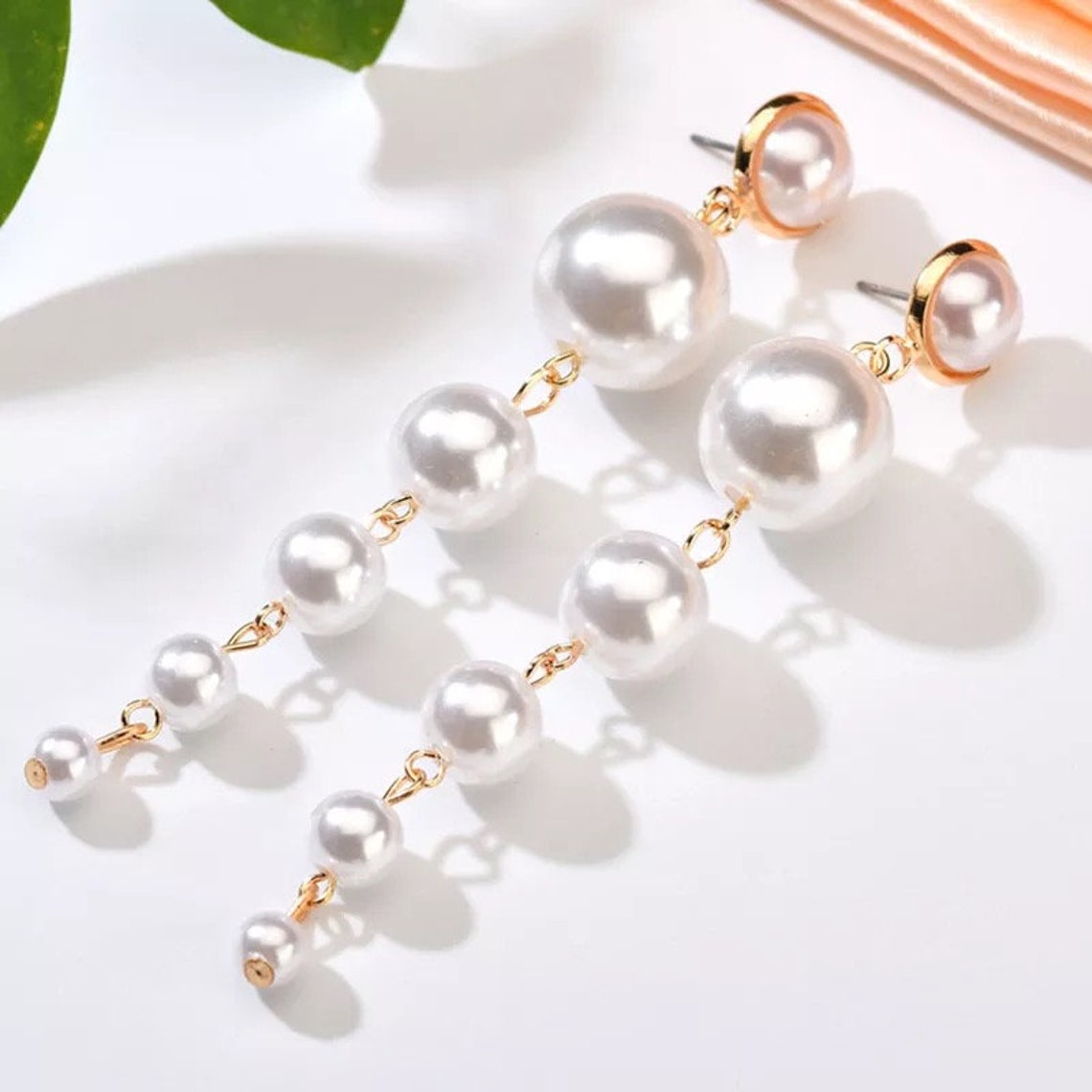 Pearl string earrings Clearance