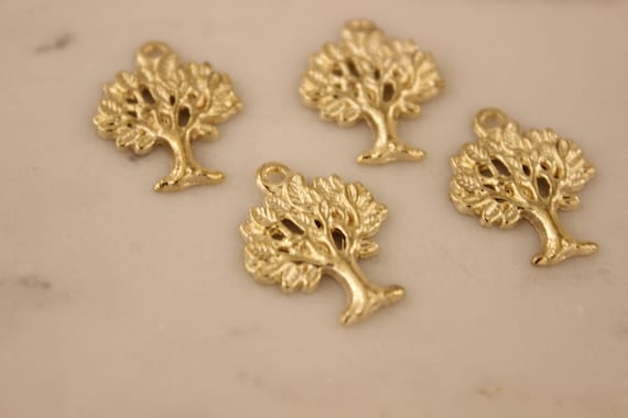 4 Tree charms gold tone GC210