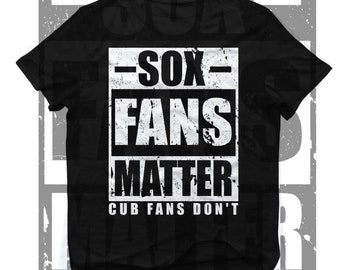 May include: Black t-shirt with white text that reads "SOX FANS MATTER CUB FANS DON'T" in a distressed font.
