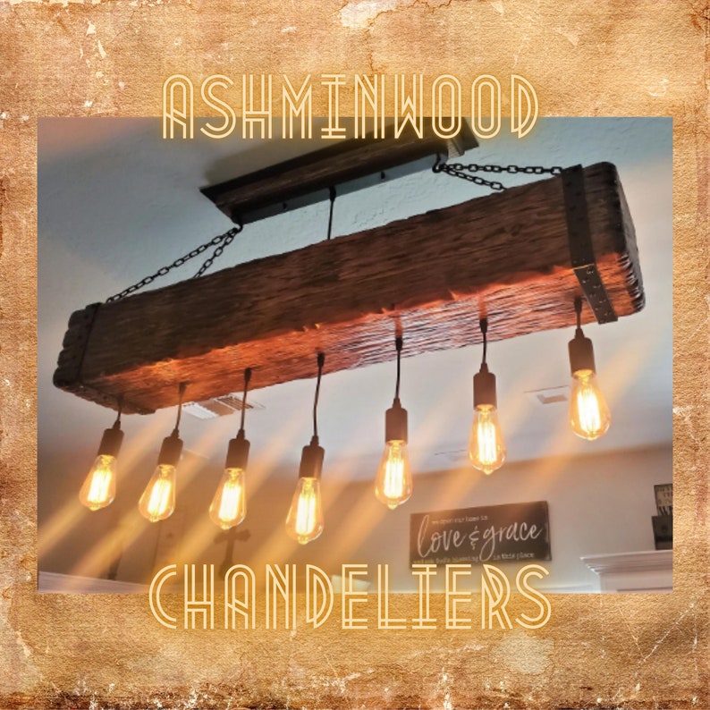 May include: A rustic wooden chandelier with six Edison bulb lights hanging from a reclaimed wood beam. The chandelier is suspended from the ceiling with a chain and has a simple, industrial design.