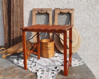 antique folding fisherman's stool in wood and iron French vintage painter's bench from the 40s