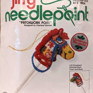 May include: A Jiffy Needlepoint kit for a 3-D ornament of a patchwork pony. The finished size is 6 1/2 inches high. The kit includes a printed design on 100% cotton canvas, 100% wool yarn, 100% rayon yarn, polyester batting, cardboard stick, needle, and instructions. The kit is designed by Charlene Gerrish and is a Christmas keepsake.
