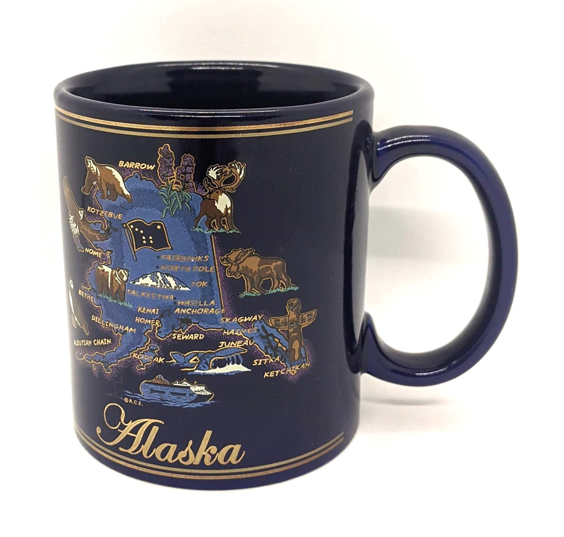 Alaska State Map Mug Souvenir Coffee Cup Animals Cities Dark Blue Gold  Letters