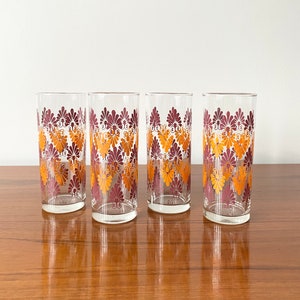 Set of 4 vintage drinking glasses with funky maroon and orange pattern