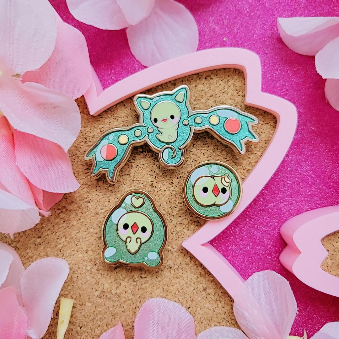 Cells Trio evolutionary line enamel pins