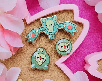 Cells Trio evolutionary line enamel pins
