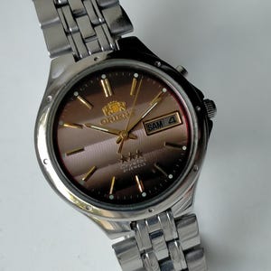 Orient 3-sterren automatisch. Vintage casual Japans stijlvol mechanisch horloge. Jaren 80