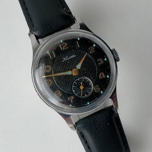 カマ・ボストーク2603 17石。モデル190CHN デザインXI。ソビエト製オリジナル機械式クラシックウォッチ。1958年製