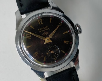 Mayak 2603. Model CHN-1124K. Rubiny na tarczy. Oryginalny radziecki mechaniczny zegarek vintage. PChZ z lat 50. XX wieku.
