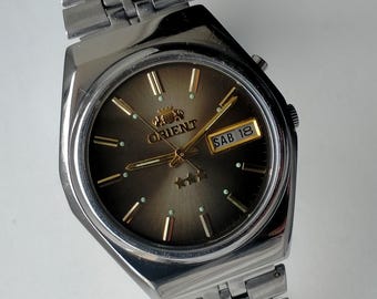 Orient 3 Star Automatic Model EA 469ED4-40 CA. Oryginalny, stylowy japoński zegarek mechaniczny z lat 90. XX wieku.