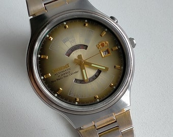 Orient College Automatic. Perpetual Calendar. Model EA 46D701-91 CA. Vintage Original Japan Mechanical Big Stylish Watch. 1990s