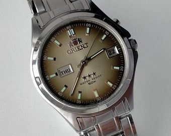 Orient 3 Stars Automatic. Model KL EM5E-CO CA. Vintage Original Japan Stylish Mechanical Watch. 1980s