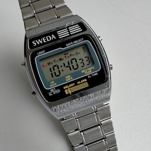 SWEDA DL5641 Chronograph Melody Vintage Original Early Digital Watch  with 1980s Rare Design