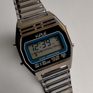 KIPLE W4G 23380 Chronograf z alarmem. Oryginalny cyfrowy stylowy francuski zegarek vintage. Lata 80.