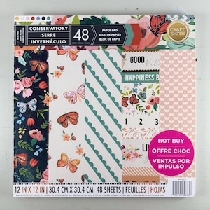 May include: A paper pad with a floral and butterfly design. The pad includes 48 sheets, each measuring 12 inches by 12 inches. The cover features the words "Conservatory" and "Paper Pad".
