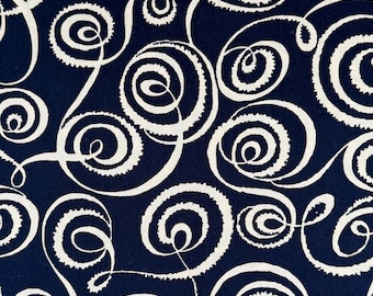May include: Dark navy blue fabric with a repeating pattern of white, swirling, spiral designs. The white lines have a textured, almost brushstroke-like appearance, creating a dynamic and visually interesting pattern. The design is reminiscent of abstract art.