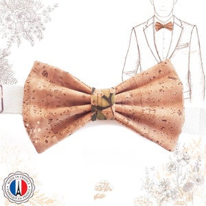 May include: A brown cork bow tie with a green and brown patterned centre. The bow tie is made in France.