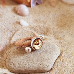 Bague réglable en liège au motif d'horloge. Création YOK CORK