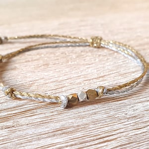 Knooparmband, vriendschapsarmband goud zilver, glitterarmband, minimalistische armband goud en zilver, filigrane armband met glitters
