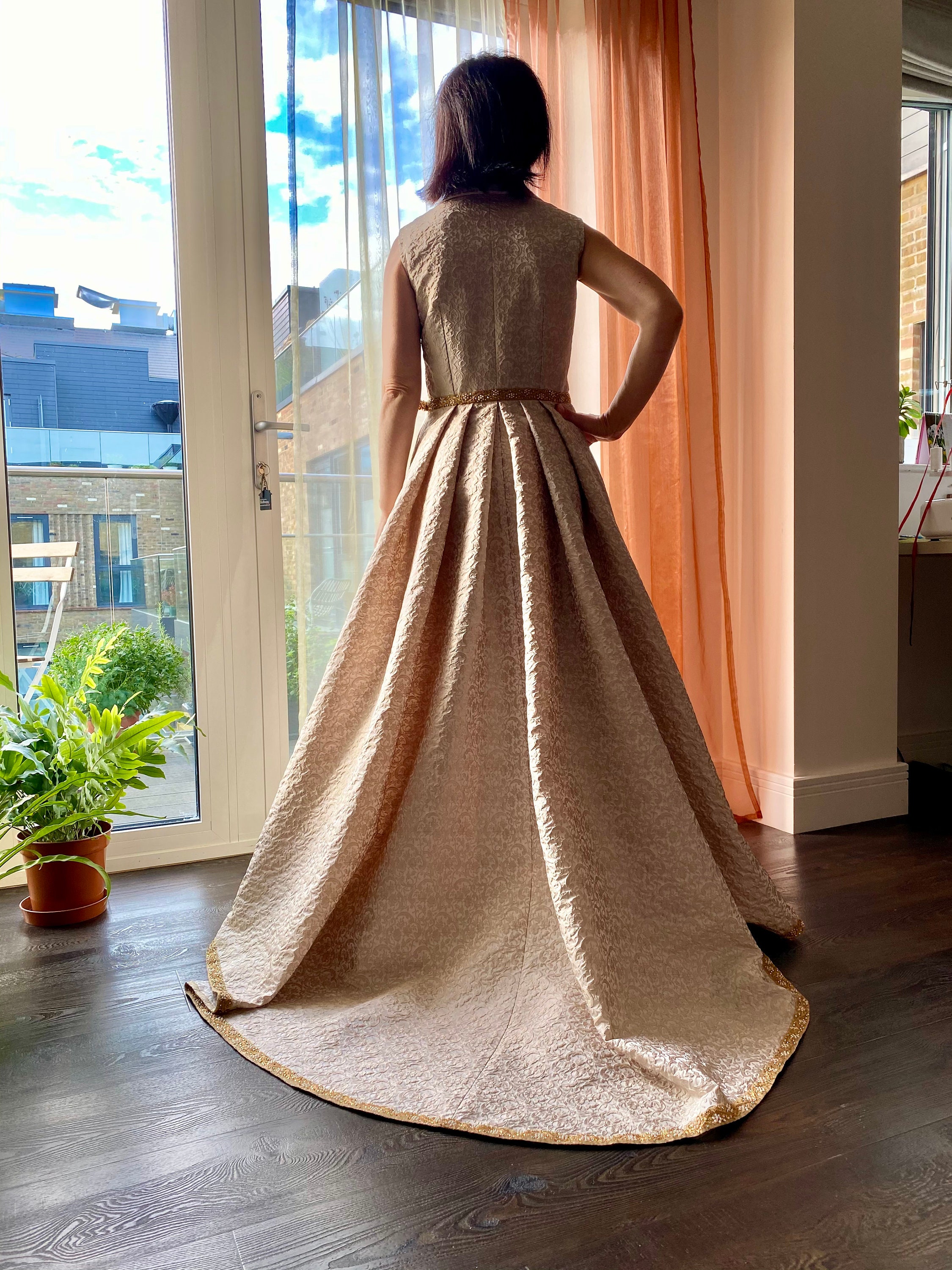 gold brocade wedding dress Beautiful semi ball brocade wedding dress with off shoulder and wide corset  back. Gold and ivory detailing
