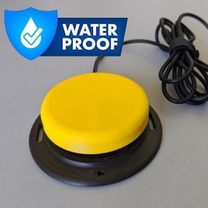 May include: A yellow, circular foot switch with a black base and a black cable. The image includes a blue shield with a water droplet and the words "WATER PROOF".