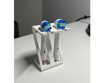 Toothbrush head holder compatible with Oral-B heads / single, double, triple, or quad