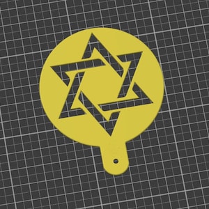 May include: A yellow plastic stencil in the shape of a six-pointed star, also known as the Star of David.