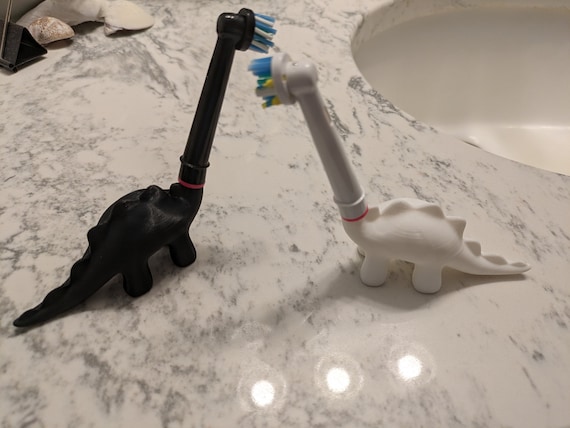 Dino Toothbrush Head Holder Compatible With Oral-b Heads - Main Image