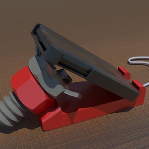 May include: A red and black phone stand with a white cord. The stand has a screw-like base and a slot for a phone.