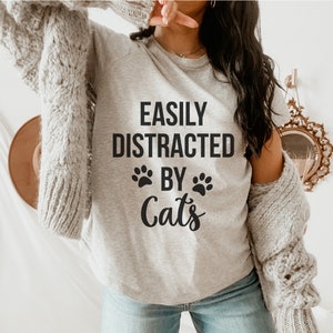 Easily Distracted By Cats Tshirt cat lover gift for cat owner funny cat mom shirt kitten funny cat shirt women cats shirt cat mama shirt