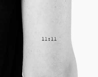 Tattoo of the angel number 1111 located on the inner