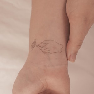 Touching Saturn Temporary Tattoo By Jakenowicz (Set of 3)