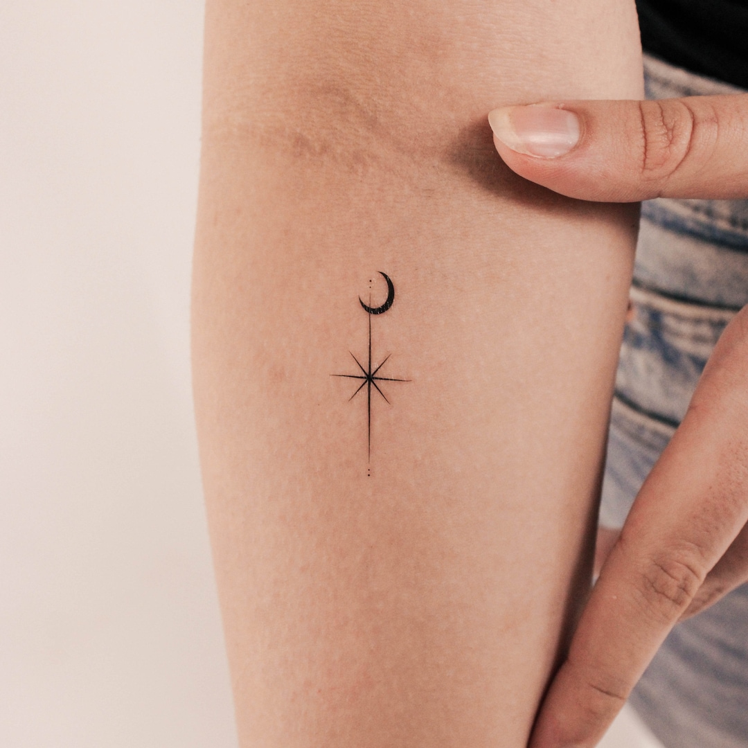Minimalist Star Tattoo with a Touch of Magic