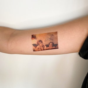 Tatuaje temporal Putti de Rafael (Madonna Sixtina) (conjunto de 3)
