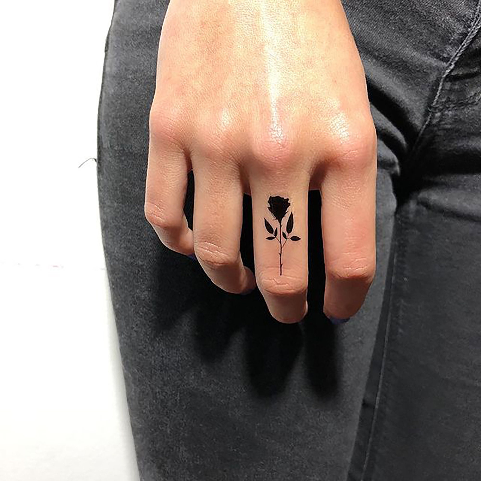Tattoo uploaded by KIMMY TAN • Simple rose finger tattoo by Kimmy Tan (IG  @KimmyTanOfficial) • Tattoodo