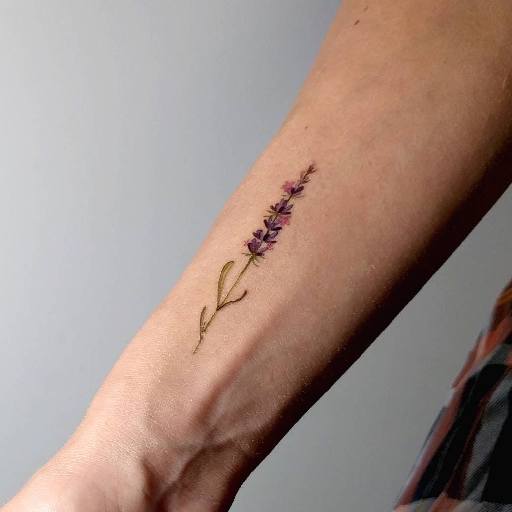 Lavender flower tattoo on the wrist. Tattoo Artist: Banul | Lavender tattoo,  Purple tattoos, Tattoos for women