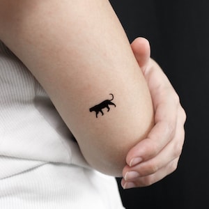 Piccolo tatuaggio temporaneo della pantera nera (set di 3)