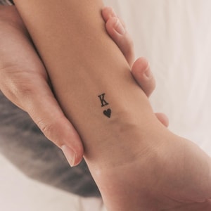 Tatuaggio temporaneo del re nero di cuori (set di 3)