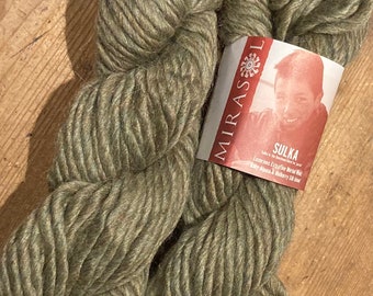 Mirasol Sulka yarn in shade #262 Palm Spring (green). 50g skein in wool/alpaca/silk mix