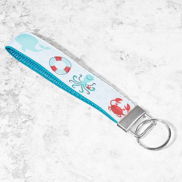 Blue And Red Sea Creature Crab, Whale And Octopus 1 Inch Key Fob Keychain Wristlet Strap With Multiple Backing Color Options