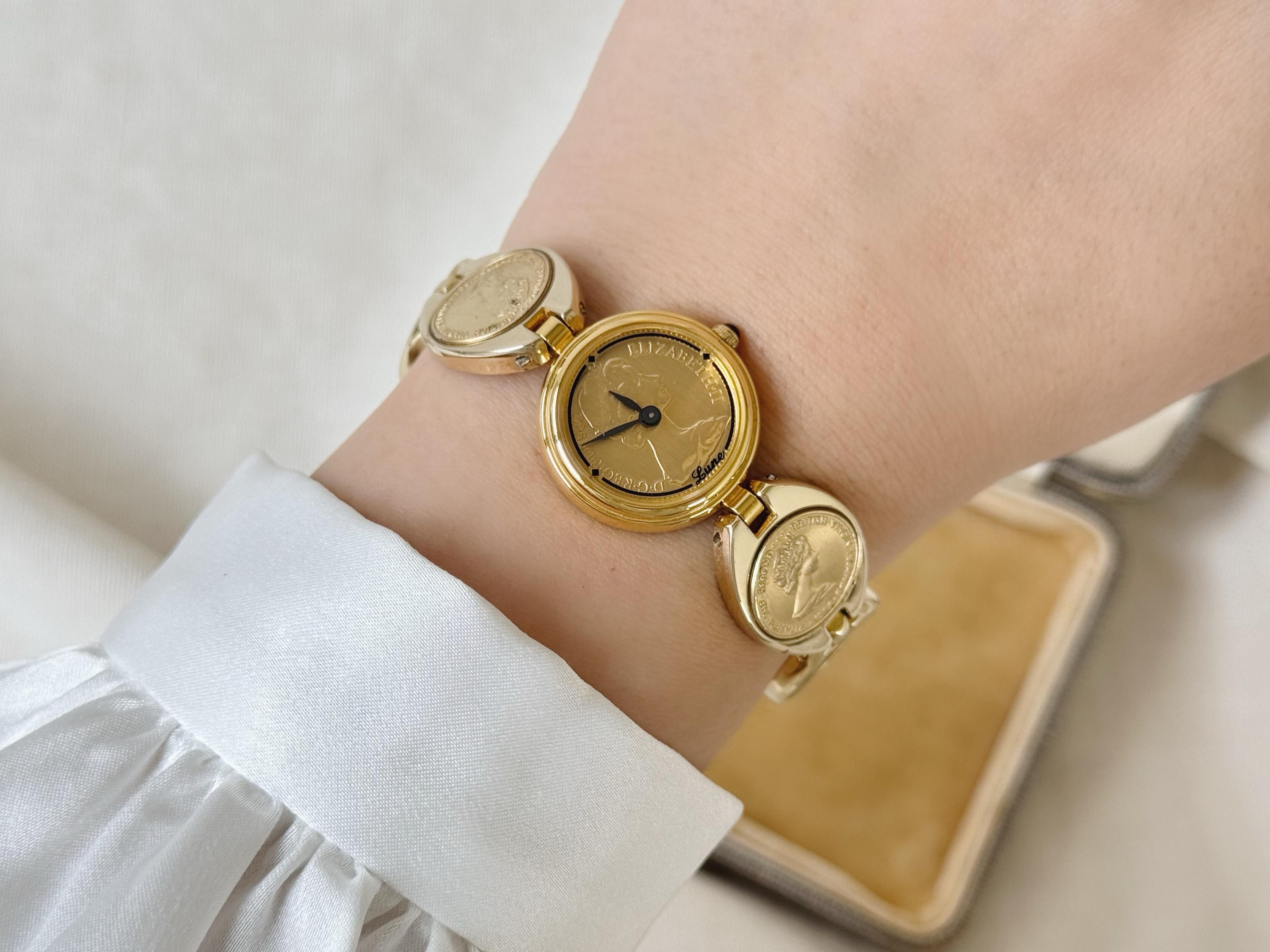E382 金貨腕時計　Lune腕時計　ウォッチ　ゴールド腕時計　金貨 ヴィンテージ LUNE ゴールドトーン エリザベス2世 コイン レディース
