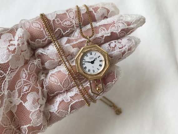 Ladies watch on a neck chain sale