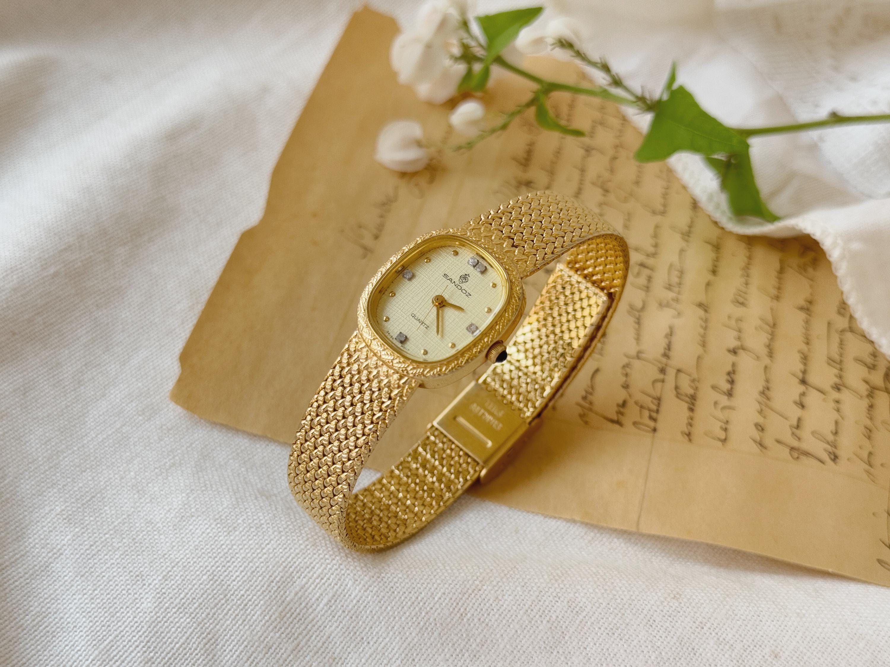 Reloj de mujer SANDOZ de metal dorado, movimiento suizo, reloj de