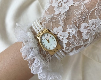 Vintage NINA RICCI Paris Damenuhr mit weißen Perlen und vergoldet, Plakette oder G 10 MC, Swiss Made, echte Perlenuhr, Damenuhr