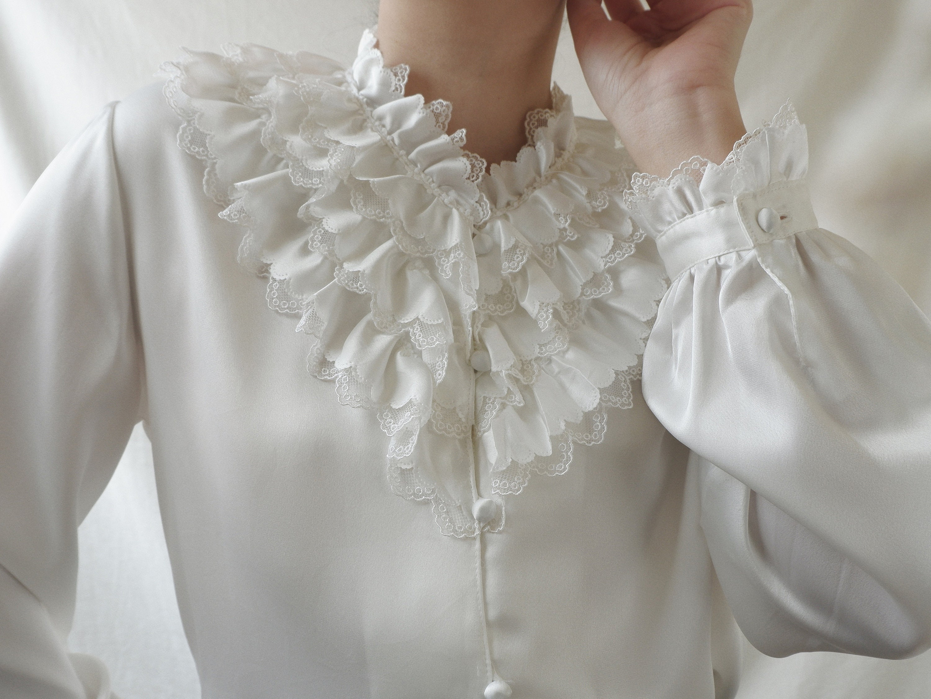white satin ruffle blouse