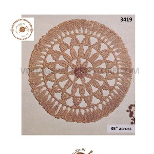 May include: A vintage crochet pattern for a round, brown, fringed wall hanging. The pattern is 35 inches across and is from Vintage Pattern Store, England.