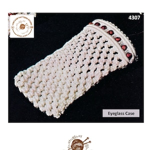 May include: A white crocheted eyeglass case with brown beads around the top edge. The case is made with a simple stitch pattern and has a rectangular shape. The image includes the text "4307" and "Eyeglass Case".