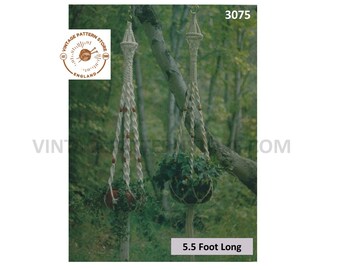 May include: Two macrame plant hangers with red beads hanging from a tree branch. The hangers are 5.5 feet long. The image includes the text "Vintage Pattern Store England" and "3075".