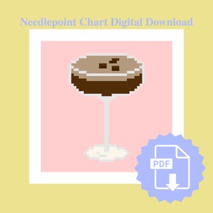 May include: A digital needlepoint chart download showing a pixelated cocktail design. The drink is brown with a light rim, set against a pink background within a white frame. A PDF icon is in the lower right corner.